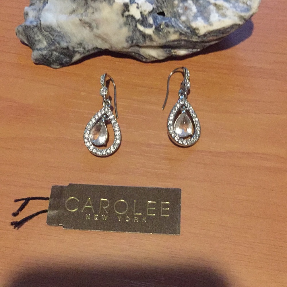 Carolee silver with crystal like stones setting